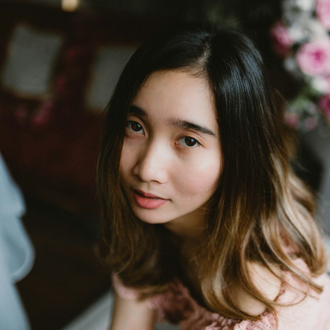 Professional audio engineer, young Asian woman smiling