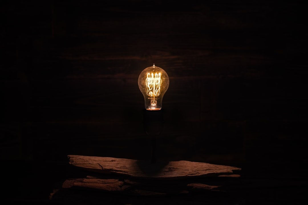 Glowing light bulb representing creative ideas for podcast