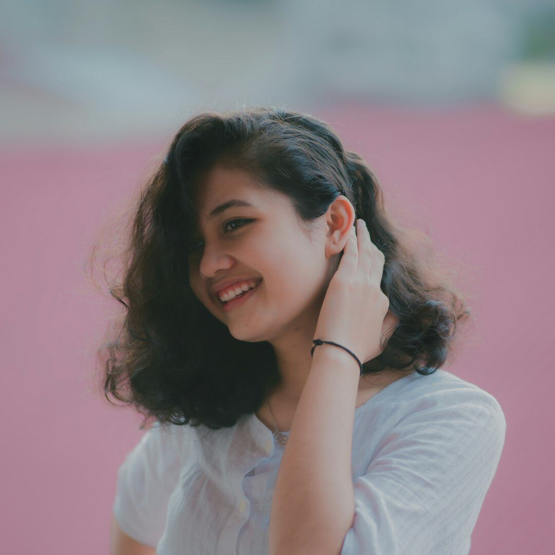 Content strategist, professional Asian woman with bright smile